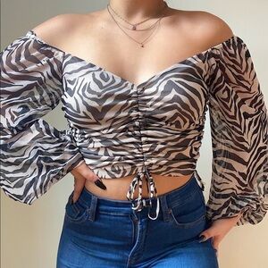 Zebra printed off shoulder top